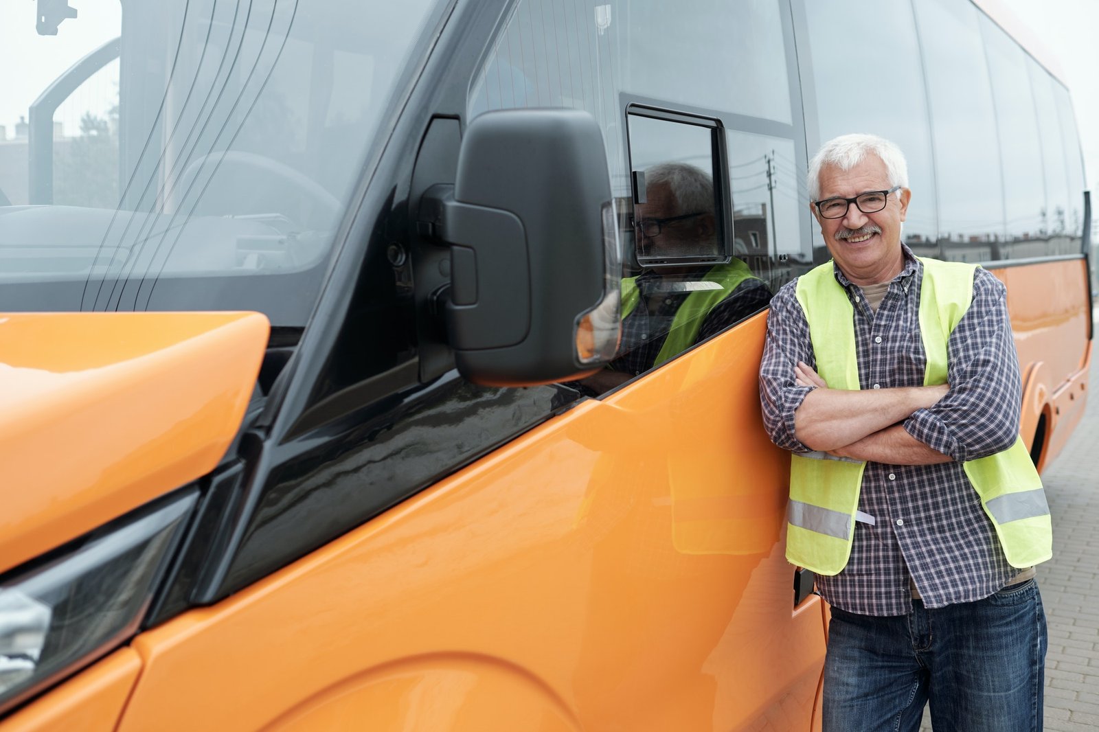 portrait-of-smiling-bus-driver